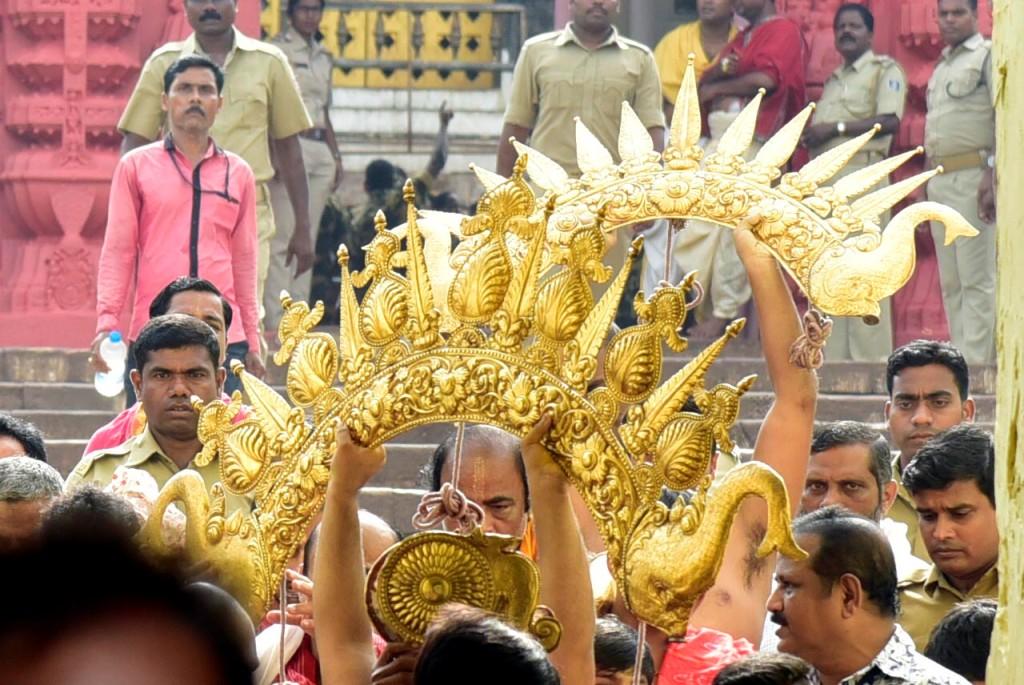 Servitors carrying 'Kiriti' - Unique Golden ornaments Offered to the the Lords during Suna Besha (Golden Attire), an important Ritual of Rath Yatra at Puri